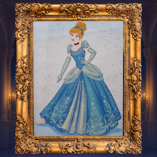 Embroidered picture of a princess in a blue dress with an ornate gold frame.